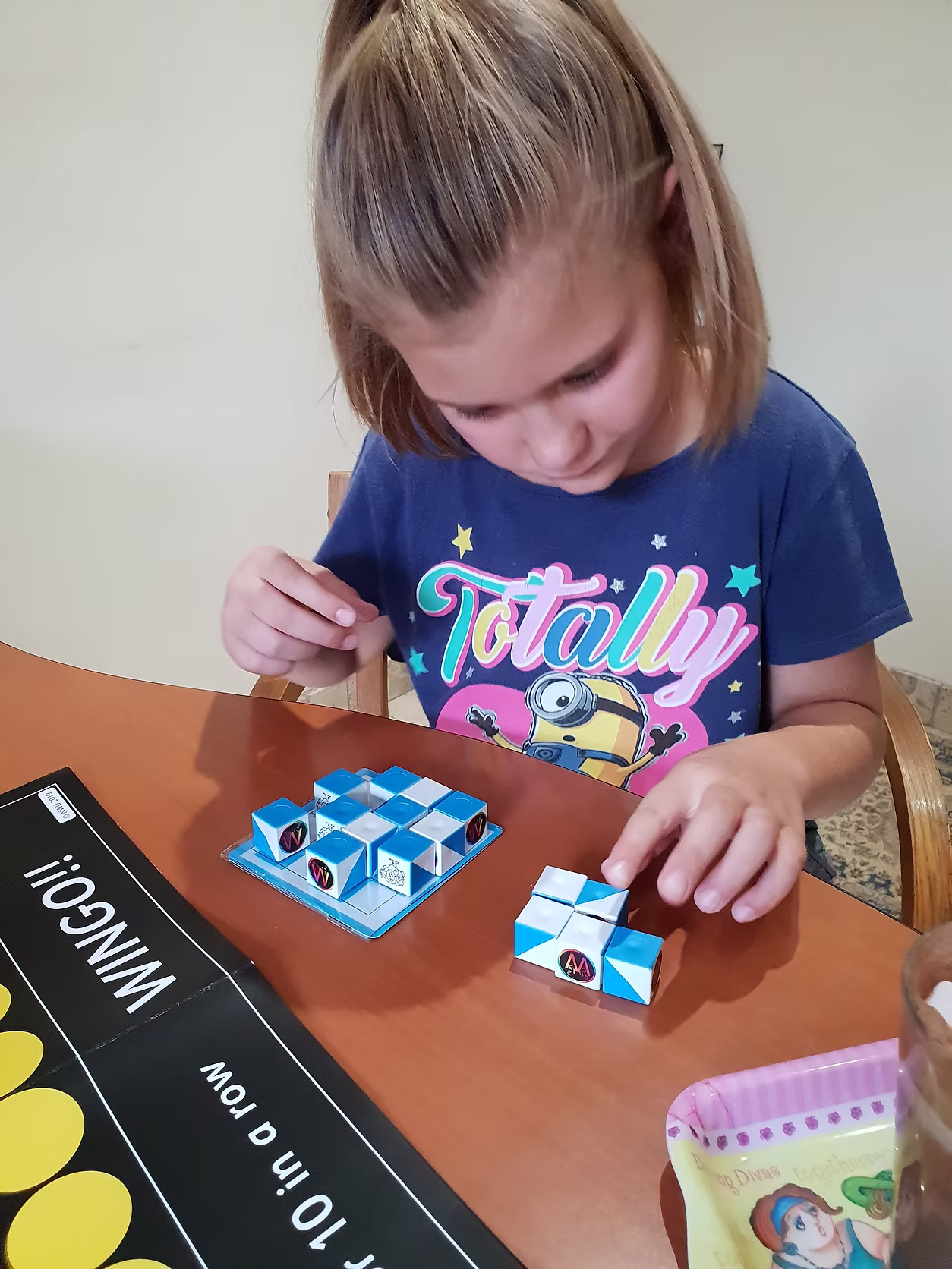A child playing the Whartels tile game